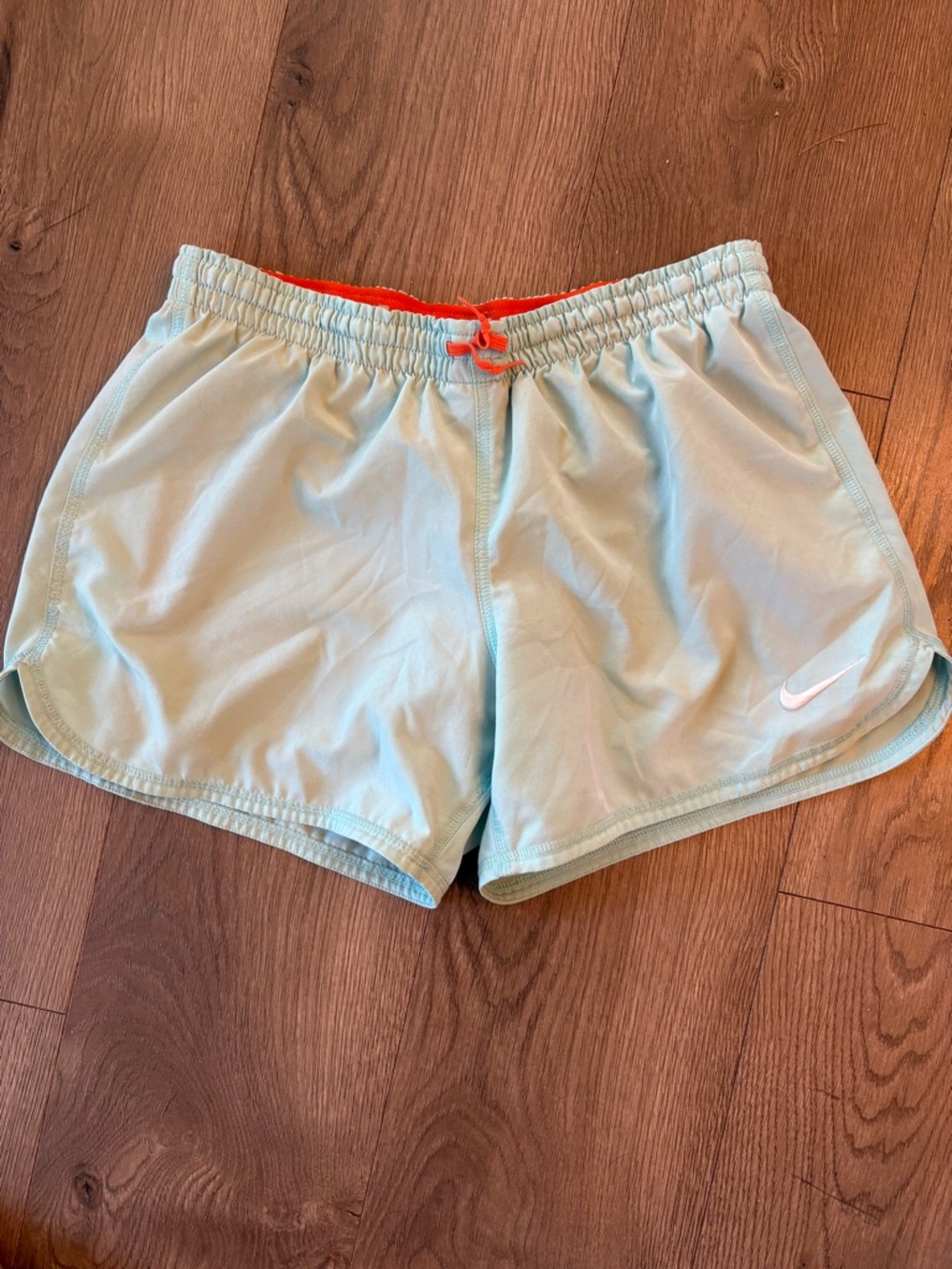 Nike Women’s Light Aqua Athletic Shorts with Orange Drawstring